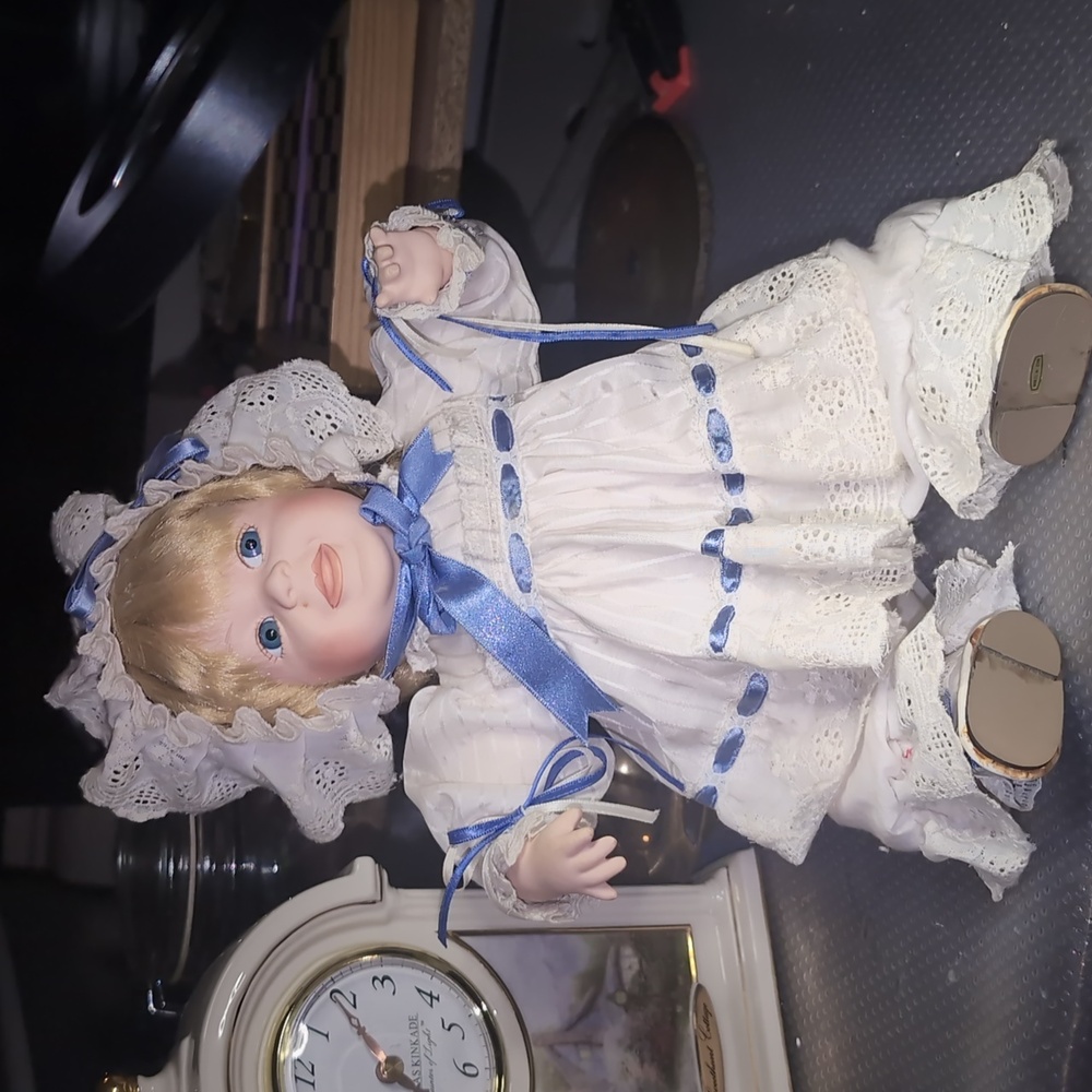 AVAILABLE - Vintage sitting porcelain baby doll by Seymore Mann.